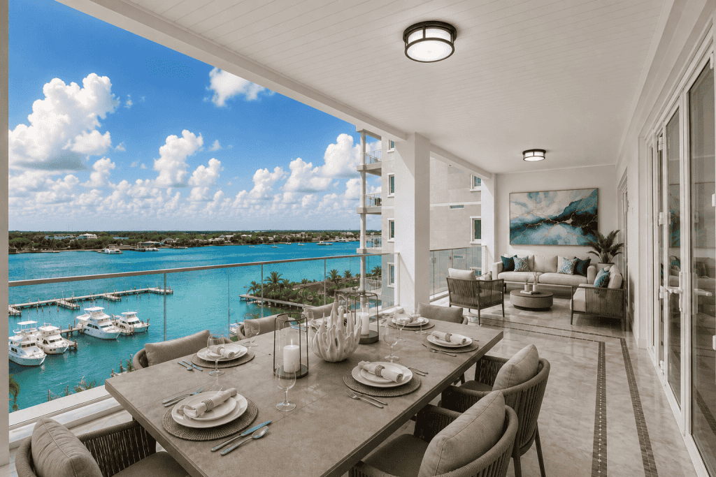 Elegant balcony overlooking marina with boats and water, perfect for relaxing or dining.