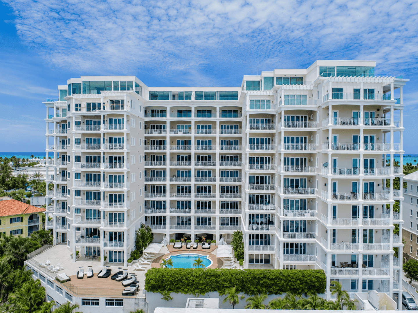 Modern oceanfront condo with spacious balconies and stunning sea views in Bahamas.