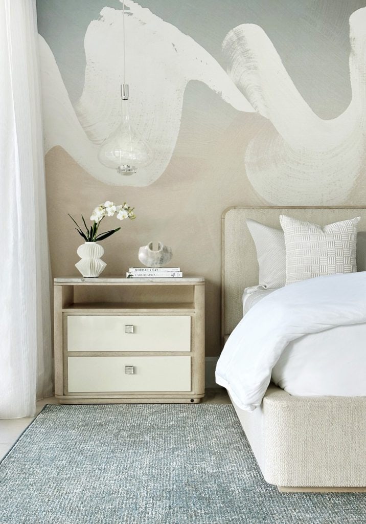 Elegant bedroom with neutral tones and modern decor at Albany Residence.